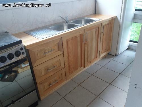 Cocina en Cipres - Cocina en Madera de Cipres acabado en laca natural. Cubierta con laca de alta resistencia. Interior en Melamina aglomerada blanca con repisas flexibles, correderas telescópicas y bisagras con cierre suave. Basurero con cierre automático, lavaplato doble con llave monomando. Muebles instalado, conectado, funcionando y sellado. Cocina en Madera de Cipres acabado en laca natural. Cubierta con laca de alta resistencia. Interior en Melamina aglomerada blanca con repisas flexibles, correderas telescópicas y bisagras con cierre suave. Basurero con cierre automático, lavaplato doble con llave monomando. Muebles instalado, conectado, funcionando y sellado.