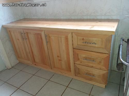 Cocina en Cipres - Cocina en Madera de Cipres acabado en laca natural. Cubierta con laca de alta resistencia. Interior en Melamina aglomerada blanca con repisas flexibles, correderas telescópicas y bisagras con cierre suave. Basurero con cierre automático, lavaplato doble con llave monomando. Muebles instalado, conectado, funcionando y sellado. Cocina en Madera de Cipres acabado en laca natural. Cubierta con laca de alta resistencia. Interior en Melamina aglomerada blanca con repisas flexibles, correderas telescópicas y bisagras con cierre suave. Basurero con cierre automático, lavaplato doble con llave monomando. Muebles instalado, conectado, funcionando y sellado.
