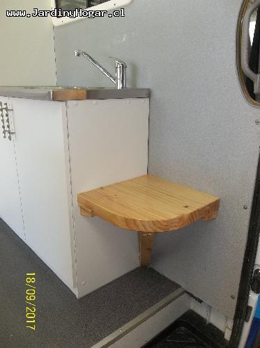 
Implementacin para una Veterinario Mvil. Muebles en Tableros Aglomerado Blanca y Cubierta en Acero Inoxidable. Sistema de Agua Potable y Agua Servida con Estanques y Bomba de agua. Lavamano en Acero inoxidable. Mueble con Cajones para las Utilidades. Puertas y Cajones con Chapa para evitar su apertura en el Transito. Canil en Tableros resistente a la Humedad. Instalacin Elctrica en 12V (Alimentacin interna) y 220V (Alimentacin externa).