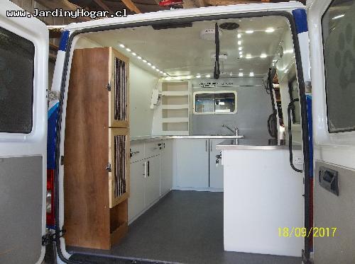 
Implementacin para una Veterinario Mvil. Muebles en Tableros Aglomerado Blanca y Cubierta en Acero Inoxidable. Sistema de Agua Potable y Agua Servida con Estanques y Bomba de agua. Lavamano en Acero inoxidable. Mueble con Cajones para las Utilidades. Puertas y Cajones con Chapa para evitar su apertura en el Transito. Canil en Tableros resistente a la Humedad. Instalacin Elctrica en 12V (Alimentacin interna) y 220V (Alimentacin externa).