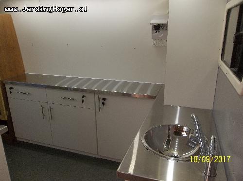 
Implementacin para una Veterinario Mvil. Muebles en Tableros Aglomerado Blanca y Cubierta en Acero Inoxidable. Sistema de Agua Potable y Agua Servida con Estanques y Bomba de agua. Lavamano en Acero inoxidable. Mueble con Cajones para las Utilidades. Puertas y Cajones con Chapa para evitar su apertura en el Transito. Canil en Tableros resistente a la Humedad. Instalacin Elctrica en 12V (Alimentacin interna) y 220V (Alimentacin externa).